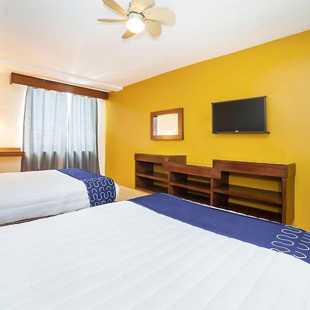 Capital O Hotel Casa Blanca เคลาญา ภายนอก รูปภาพ