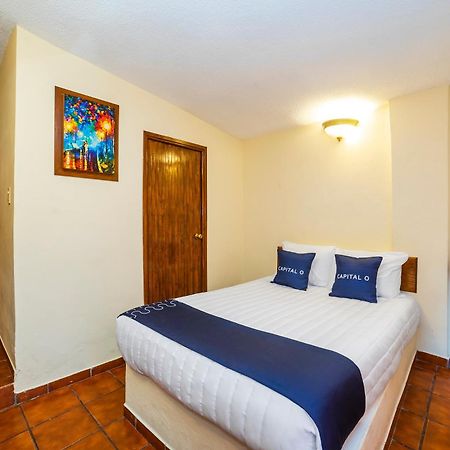 Capital O Hotel Casa Blanca เคลาญา ภายนอก รูปภาพ