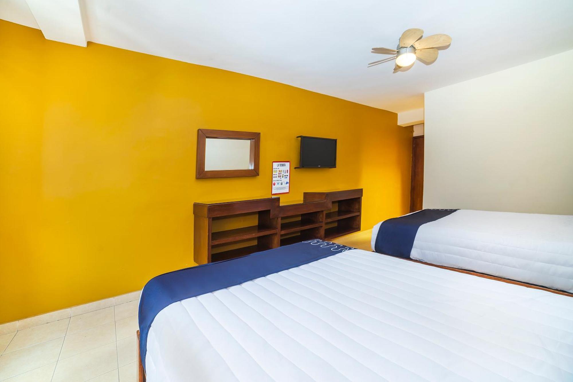 Capital O Hotel Casa Blanca เคลาญา ภายนอก รูปภาพ