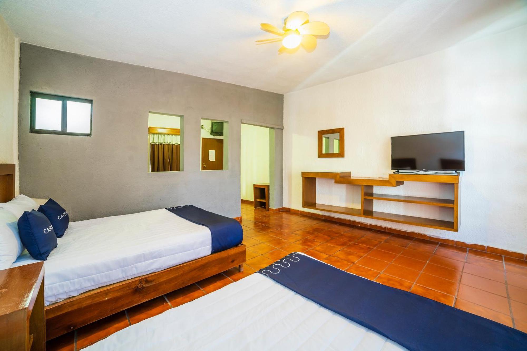 Capital O Hotel Casa Blanca เคลาญา ภายนอก รูปภาพ