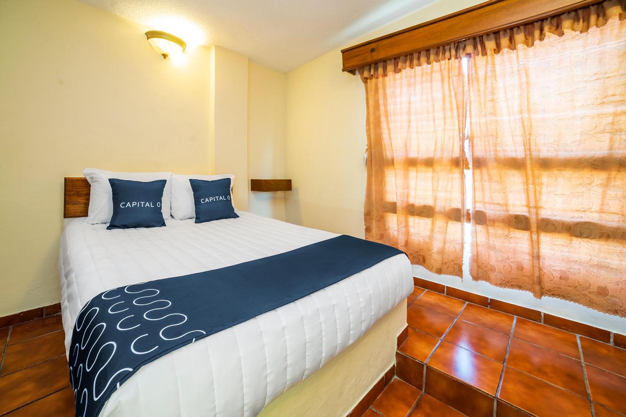 Capital O Hotel Casa Blanca เคลาญา ภายนอก รูปภาพ