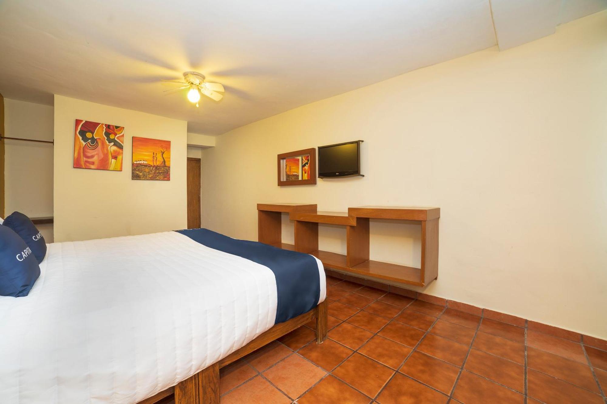 Capital O Hotel Casa Blanca เคลาญา ภายนอก รูปภาพ