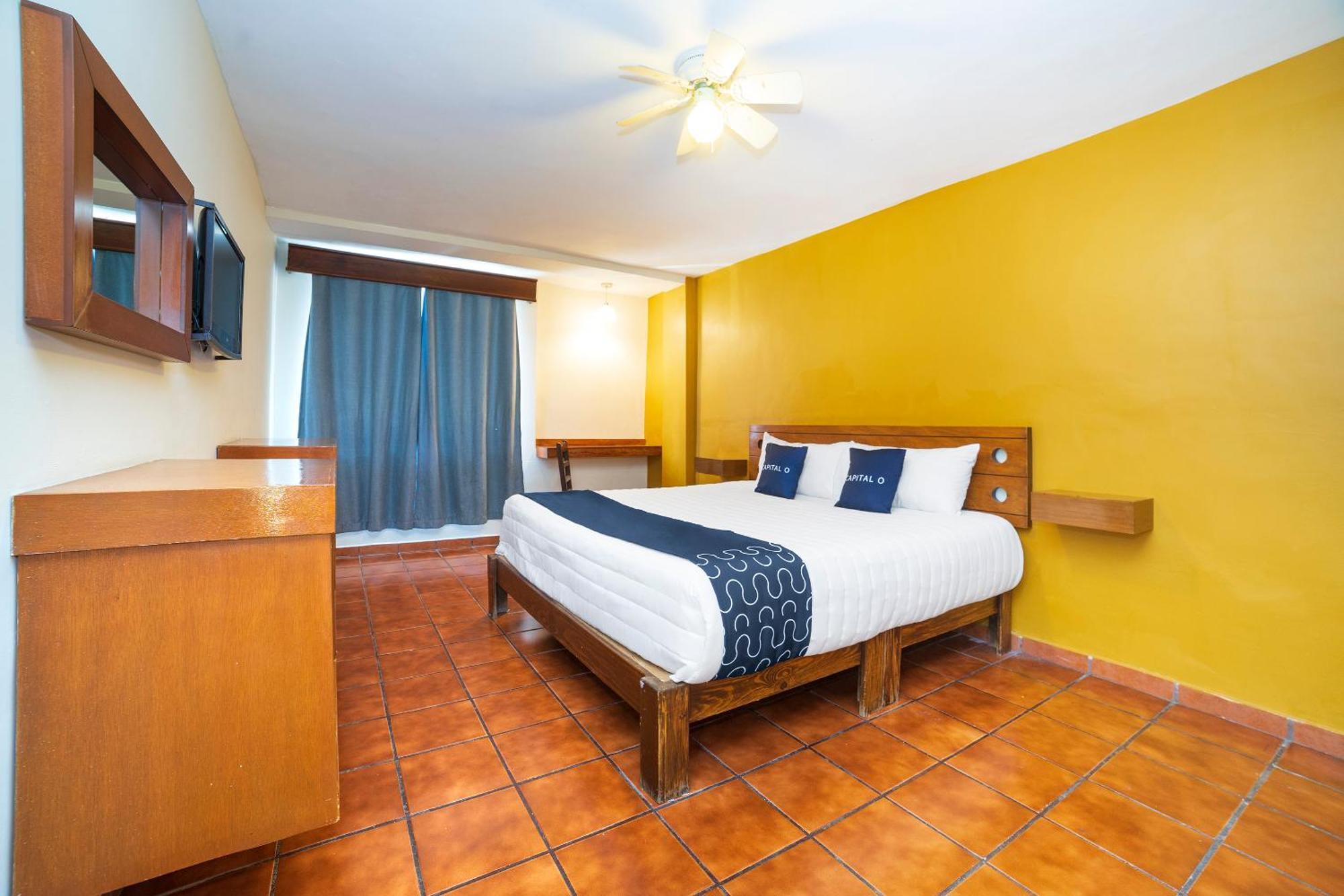 Capital O Hotel Casa Blanca เคลาญา ภายนอก รูปภาพ