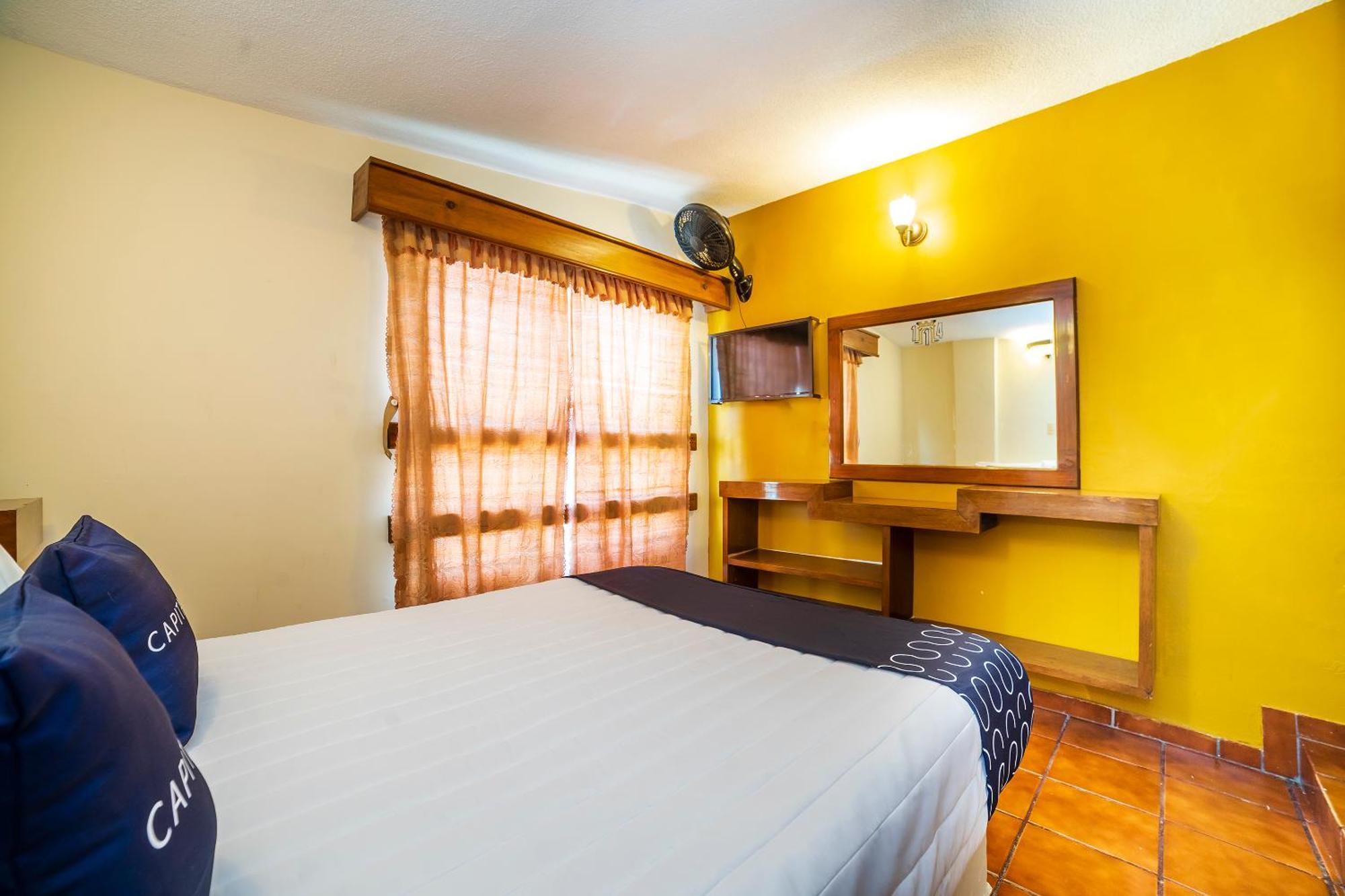 Capital O Hotel Casa Blanca เคลาญา ภายนอก รูปภาพ