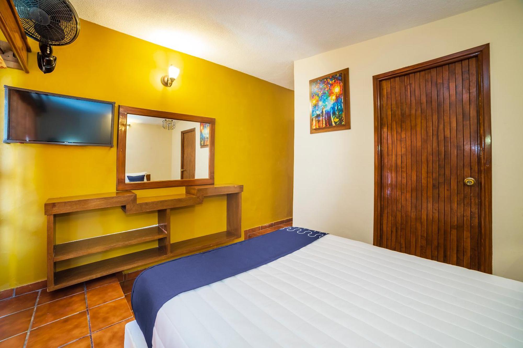 Capital O Hotel Casa Blanca เคลาญา ภายนอก รูปภาพ