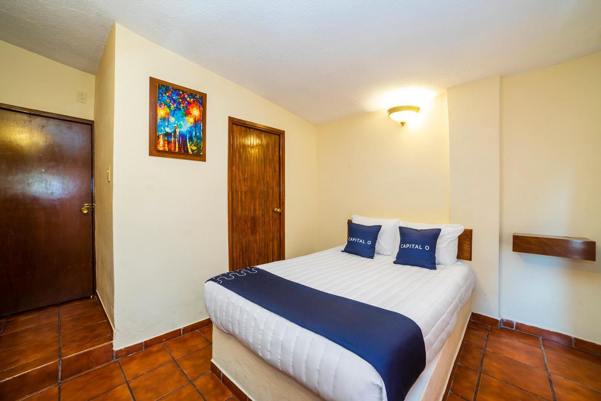 Capital O Hotel Casa Blanca เคลาญา ภายนอก รูปภาพ